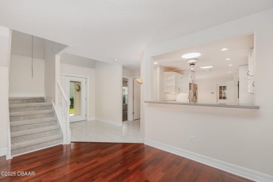 This end-unit villa condominium offers scenic golf course views on Spruce Creek Golf Club in Florida - for sale on GolfHomes.com, golf home, golf lot