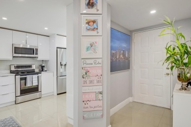 WELCOME TO THIS BEAUTIFUL UPGRADED  TOP FLOOR CONDO WITH  ITS on Poinciana Golf Club in Florida - for sale on GolfHomes.com, golf home, golf lot