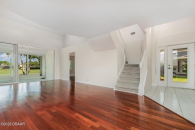 This end-unit villa condominium offers scenic golf course views on Spruce Creek Golf Club in Florida - for sale on GolfHomes.com, golf home, golf lot
