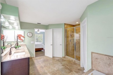 Welcome to this lovingly maintained 4-bedroom, 2.5-bath home on Hunters Green Country Club in Florida - for sale on GolfHomes.com, golf home, golf lot