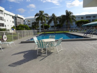 WELCOME TO THIS BEAUTIFUL UPGRADED  TOP FLOOR CONDO WITH  ITS on Poinciana Golf Club in Florida - for sale on GolfHomes.com, golf home, golf lot