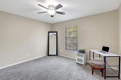 Welcome to this lovingly maintained 4-bedroom, 2.5-bath home on Hunters Green Country Club in Florida - for sale on GolfHomes.com, golf home, golf lot