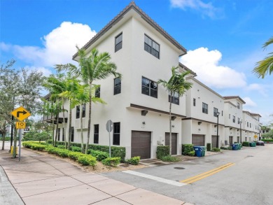 Located in the vibrant heart of Downtown Doral, this three-story on Doral Golf Resort in Florida - for sale on GolfHomes.com, golf home, golf lot