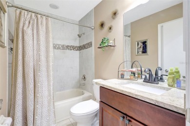 Welcome to this lovingly maintained 4-bedroom, 2.5-bath home on Hunters Green Country Club in Florida - for sale on GolfHomes.com, golf home, golf lot