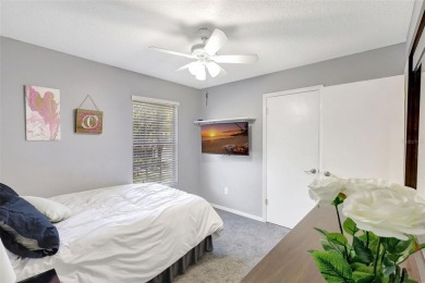 Welcome to this lovingly maintained 4-bedroom, 2.5-bath home on Hunters Green Country Club in Florida - for sale on GolfHomes.com, golf home, golf lot