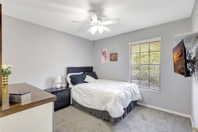 Welcome to this lovingly maintained 4-bedroom, 2.5-bath home on Hunters Green Country Club in Florida - for sale on GolfHomes.com, golf home, golf lot
