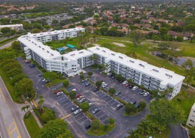 WELCOME TO THIS BEAUTIFUL UPGRADED  TOP FLOOR CONDO WITH  ITS on Poinciana Golf Club in Florida - for sale on GolfHomes.com, golf home, golf lot