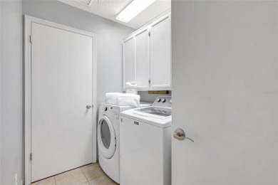 Welcome to this lovingly maintained 4-bedroom, 2.5-bath home on Hunters Green Country Club in Florida - for sale on GolfHomes.com, golf home, golf lot
