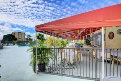 WELCOME TO THIS BEAUTIFUL UPGRADED  TOP FLOOR CONDO WITH  ITS on Poinciana Golf Club in Florida - for sale on GolfHomes.com, golf home, golf lot