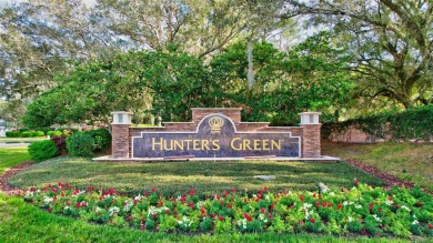 Welcome to this lovingly maintained 4-bedroom, 2.5-bath home on Hunters Green Country Club in Florida - for sale on GolfHomes.com, golf home, golf lot