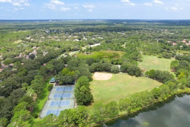 Welcome to this lovingly maintained 4-bedroom, 2.5-bath home on Hunters Green Country Club in Florida - for sale on GolfHomes.com, golf home, golf lot