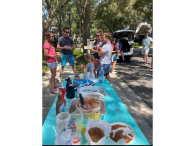Welcome to this lovingly maintained 4-bedroom, 2.5-bath home on on Hunters Green Country Club in Florida - for sale on GolfHomes.com, golf home, golf lot