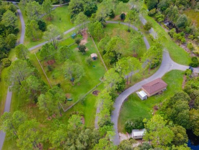 Welcome to this lovingly maintained 4-bedroom, 2.5-bath home on on Hunters Green Country Club in Florida - for sale on GolfHomes.com, golf home, golf lot