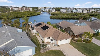 Waterfront living with Gulf access in the heart of Gulf Harbors on Gulf Harbors Golf Course in Florida - for sale on GolfHomes.com, golf home, golf lot