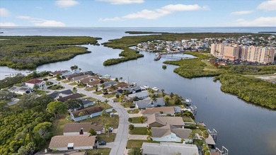 Waterfront living with Gulf access in the heart of Gulf Harbors on Gulf Harbors Golf Course in Florida - for sale on GolfHomes.com, golf home, golf lot