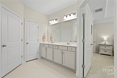 Welcome to this stunning coastal retreat in prestigious Savannah on Savannah Quarters Country Club in Georgia - for sale on GolfHomes.com, golf home, golf lot