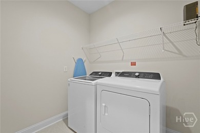 Welcome to this stunning coastal retreat in prestigious Savannah on Savannah Quarters Country Club in Georgia - for sale on GolfHomes.com, golf home, golf lot