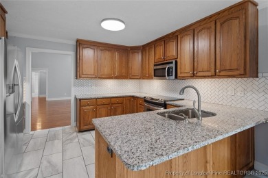 Premier Architecture and updates throughout this 3,500+ square on Gates Four Golf and Country Club in North Carolina - for sale on GolfHomes.com, golf home, golf lot