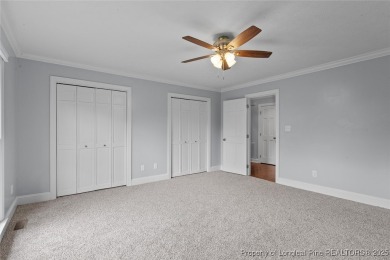 Premier Architecture and updates throughout this 3,500+ square on Gates Four Golf and Country Club in North Carolina - for sale on GolfHomes.com, golf home, golf lot