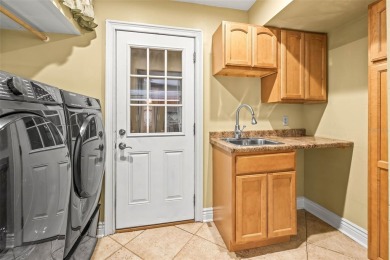 Welcome to 11804 Carrollwood Village Cove - Where Luxury Living on Emerald Greens Golf Resort and Country Club in Florida - for sale on GolfHomes.com, golf home, golf lot