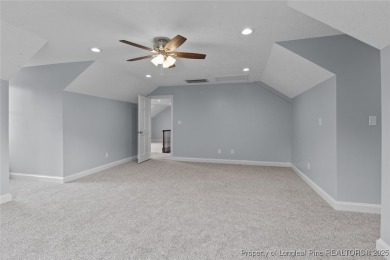 Premier Architecture and updates throughout this 3,500+ square on Gates Four Golf and Country Club in North Carolina - for sale on GolfHomes.com, golf home, golf lot