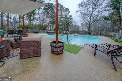 Welcome home to this beautiful 4-bedroom, 2.5-bath all-brick on Honey Creek Country Club in Georgia - for sale on GolfHomes.com, golf home, golf lot