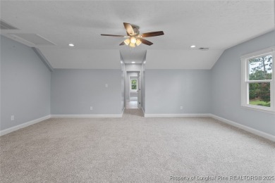 Premier Architecture and updates throughout this 3,500+ square on Gates Four Golf and Country Club in North Carolina - for sale on GolfHomes.com, golf home, golf lot
