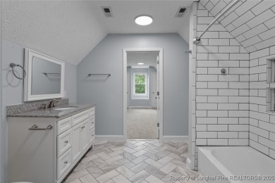 Premier Architecture and updates throughout this 3,500+ square on Gates Four Golf and Country Club in North Carolina - for sale on GolfHomes.com, golf home, golf lot