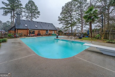 Welcome home to this beautiful 4-bedroom, 2.5-bath all-brick on Honey Creek Country Club in Georgia - for sale on GolfHomes.com, golf home, golf lot