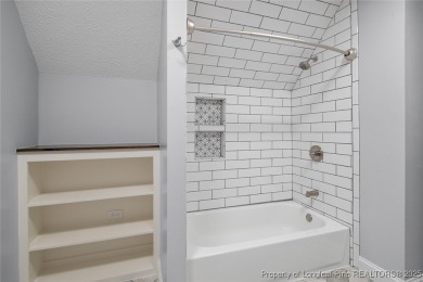 Premier Architecture and updates throughout this 3,500+ square on Gates Four Golf and Country Club in North Carolina - for sale on GolfHomes.com, golf home, golf lot
