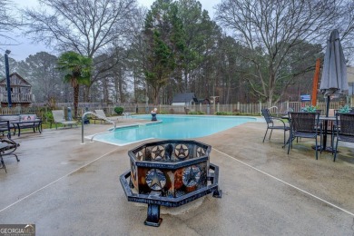 Welcome home to this beautiful 4-bedroom, 2.5-bath all-brick on Honey Creek Country Club in Georgia - for sale on GolfHomes.com, golf home, golf lot