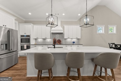 Welcome to this stunning 3,475 sq ft home nestled on a on Traditions of Braselton Golf Club in Georgia - for sale on GolfHomes.com, golf home, golf lot