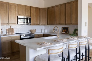 Welcome to this beautiful 2-bedroom, 2-bath townhome located in on The Legacy Golf Resort in Arizona - for sale on GolfHomes.com, golf home, golf lot