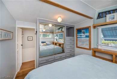 Beautifully maintained and upgraded remodeled lakefront on Del Tura Golf and Country Club in Florida - for sale on GolfHomes.com, golf home, golf lot