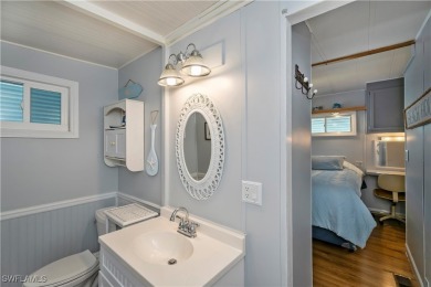 Beautifully maintained and upgraded remodeled lakefront on Del Tura Golf and Country Club in Florida - for sale on GolfHomes.com, golf home, golf lot