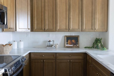 Welcome to this beautiful 2-bedroom, 2-bath townhome located in on The Legacy Golf Resort in Arizona - for sale on GolfHomes.com, golf home, golf lot