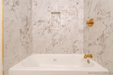 Completely reimagined with luxury in mind, this 4 bed, 3 bath on Sycamore Creek Golf Club in Missouri - for sale on GolfHomes.com, golf home, golf lot