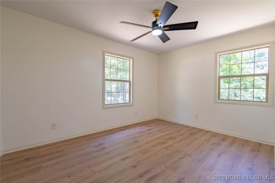Completely reimagined with luxury in mind, this 4 bed, 3 bath on Sycamore Creek Golf Club in Missouri - for sale on GolfHomes.com, golf home, golf lot