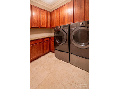 This spectacular 10,144 square foot waterfront home has a on Old North State Club at Uwharrie Point Golf community in North Carolina - for sale on GolfHomes.com, golf home, golf lot