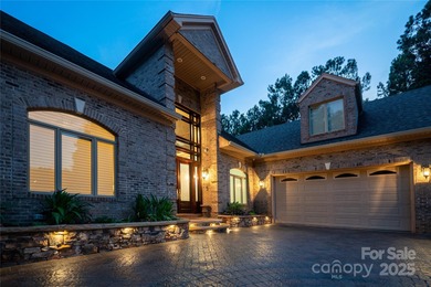 This spectacular 10,144 square foot waterfront home has a on Old North State Club at Uwharrie Point Golf community in North Carolina - for sale on GolfHomes.com, golf home, golf lot