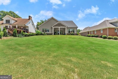 Welcome to this stunning 3,475 sq ft home nestled on a on Traditions of Braselton Golf Club in Georgia - for sale on GolfHomes.com, golf home, golf lot