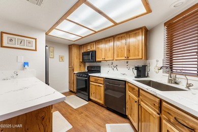 Discover one of Lake Havasu's best values in condo living! on London Bridge Golf Course in Arizona - for sale on GolfHomes.com, golf home, golf lot