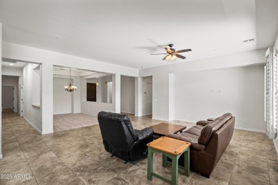Charming ranch home features 4 bedrooms plus a den. Step inside on Wigwam Golf  Resort Litchfield Park  in Arizona - for sale on GolfHomes.com, golf home, golf lot