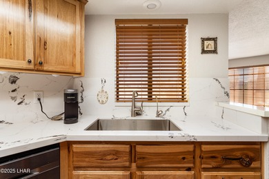 Discover one of Lake Havasu's best values in condo living! on London Bridge Golf Course in Arizona - for sale on GolfHomes.com, golf home, golf lot