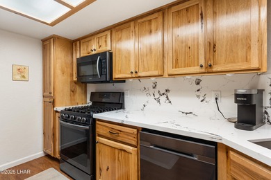 Discover one of Lake Havasu's best values in condo living! on London Bridge Golf Course in Arizona - for sale on GolfHomes.com, golf home, golf lot