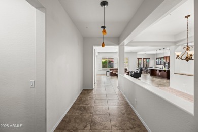 Charming ranch home features 4 bedrooms plus a den. Step inside on Wigwam Golf  Resort Litchfield Park  in Arizona - for sale on GolfHomes.com, golf home, golf lot