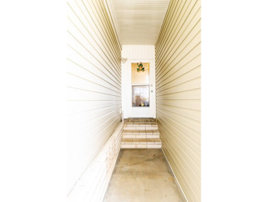 Welcome to your idyllic retreat at 1426 Whispering Pines Loop on Lily Lake Golf and RV Resort in Florida - for sale on GolfHomes.com, golf home, golf lot