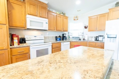 Welcome to your idyllic retreat at 1426 Whispering Pines Loop on Lily Lake Golf and RV Resort in Florida - for sale on GolfHomes.com, golf home, golf lot