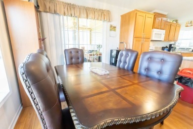 Welcome to your idyllic retreat at 1426 Whispering Pines Loop on Lily Lake Golf and RV Resort in Florida - for sale on GolfHomes.com, golf home, golf lot