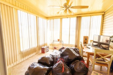 Welcome to your idyllic retreat at 1426 Whispering Pines Loop on Lily Lake Golf and RV Resort in Florida - for sale on GolfHomes.com, golf home, golf lot